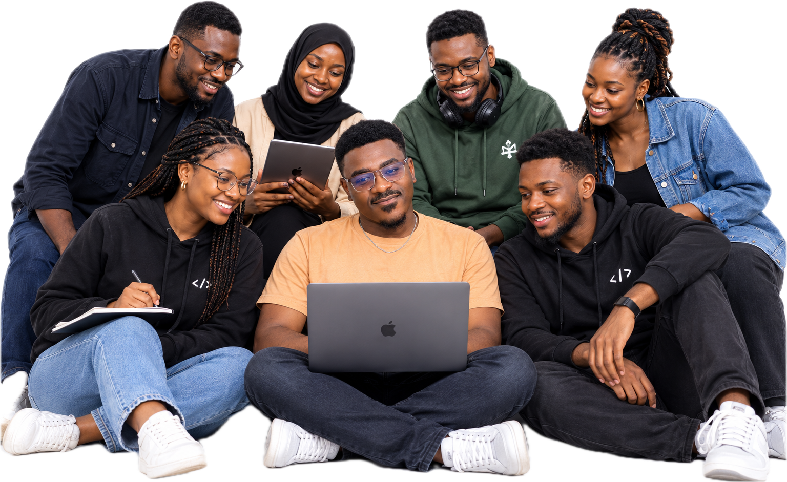 The Defolt Labs engineering team working together on laptops