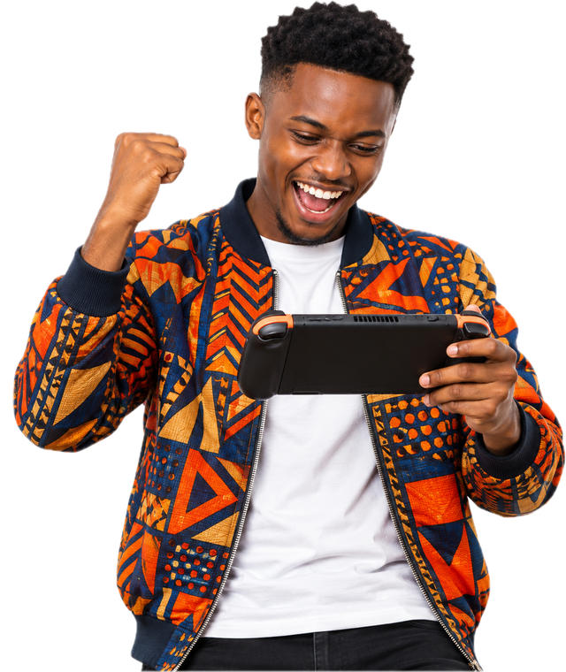 Excited East African gamer in a kitenge bomber jacket playing a handheld console
